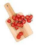Cherry tomatoes on cutting board. View from above. Isolated on white background