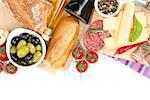 Cheese, prosciutto, bread, vegetables and spices. Isolated on white background with copy space