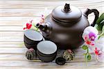 set for a traditional tea drinking (kettle, cups and various grain tea)