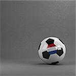 Dutch soccer ball in front of plaster wall