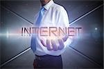 Businessman presenting the word internet against futuristic screen with lines