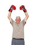 Portrait of a cheerful senior boxer standing over white background