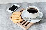 Coffee with bread or cookies for breakfast.