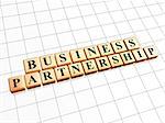 business partnership - text in 3d golden cubes with black letters, teamwork growth concept words