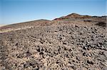 Rocky mountain slope landscape in an arid barren desert environment