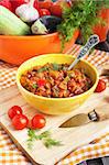 Vegetable stew (Ratatouille) in yellow bowl on the table