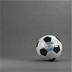 Argentinian soccer ball in front of plaster wall