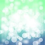 Blurred bokeh holiday blue green background