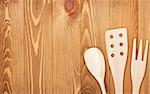 Kitchen utensils on wooden table background. View from above with copy space