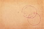 Wine stains on brown paper background with copy space