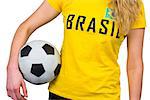 Football fan in brasil tshirt on white background