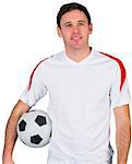 Smiling football fan in white on white background