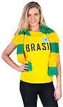 Pretty football fan in brasil tshirt on white background