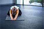 Young woman in tortoise pose