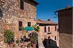 View of building with balcony garden, San Gimignano, Province of Siena, Tuscany, Italy