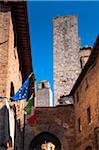 Buildings and Flags, San Gimignano, Province of Siena, Tuscany, Italy