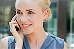 Young woman making phone call using smartphone