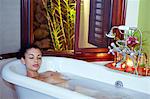 Central America, Belize, Mountain Pine Ridge, Hidden Valley, Secret falls. A beautiful young woman taking a foam bath at the Hidden Valley Inn (MR) (PR)