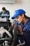 Concentrating trainee checking machine in workshop