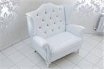 beautiful white armchair in a modern apartment