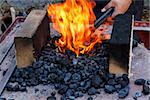 outdoor Old fashioned blacksmith furnace with burning coals