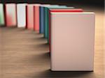 Several books over the table. Your text or image on the cover. Clipping path included.