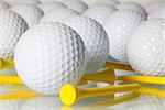 Different golf balls on a glass table