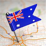 Small Flag of  Australia on a Map Background with Selective Focus.