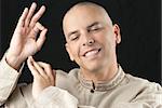 Close-up of a buddhist giving the dharmachakra gesture.