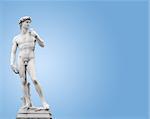 Michelangelo's David. On blue background