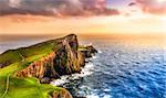 Colorful ocean coast panoramic sunset at Neist point lighthouse, Scotland, United Kingdom
