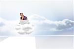 Thinking man sitting on cloud using laptop and smiling against clouds in a room