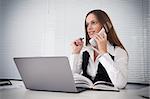 business concept. Businesswoman talking on the phone in office