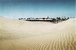 Sand dunes on the beach in Maspalomas. Vintage photo. Hotel.