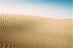 Sand dunes on the beach in Maspalomas. Vintage photo.