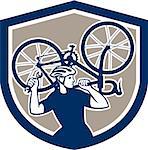 Illustration of a cyclist bicycle mechanic carrying racing bike on shoulder holding spanner wrench looking to side set inside shield crest shape done in retro style.