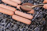 roasted sausages on a barbecue grill outdoors picnic