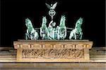 Brandenburg Gate detail at night, a former city gate and one of the main symbols of Berlin, Germany