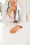 Closeup on thoughtful medical doctor woman