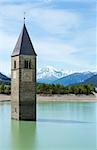 Flooded (in 1950) bell tower in Reschensee (Italy, church building in 14th-century)