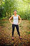 Woman standing in woods