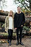 Portrait of young happy couple in woods