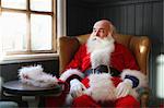 Santa Claus taking break in armchair