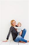 Studio portrait of mother and baby girl