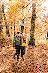 Couple walking in forest