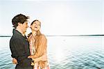 Couple laughing, Lake Starnberg, Bavaria, Germany