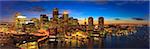 City skyline lit up at dusk, Boston, Massachusetts, USA