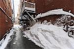 Back alley off a Salem Street after blizzard in Boston, Suffolk County, Massachusetts, USA