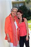 Senior woman smiling with her granddaughter