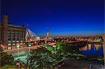 City lit up at dusk, Leonard P. Zakim Bunker Hill Bridge, North End, Boston, Massachusetts, USA